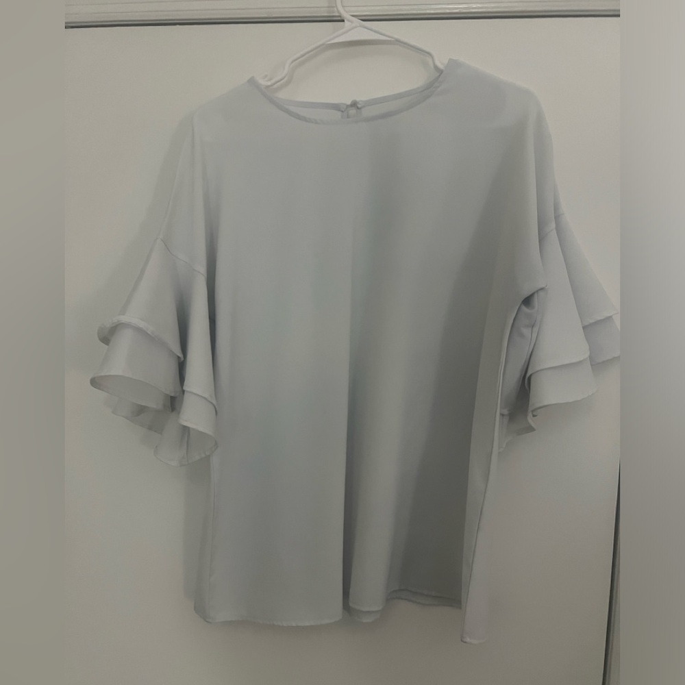 Women’s size large white bell sleeve blouse